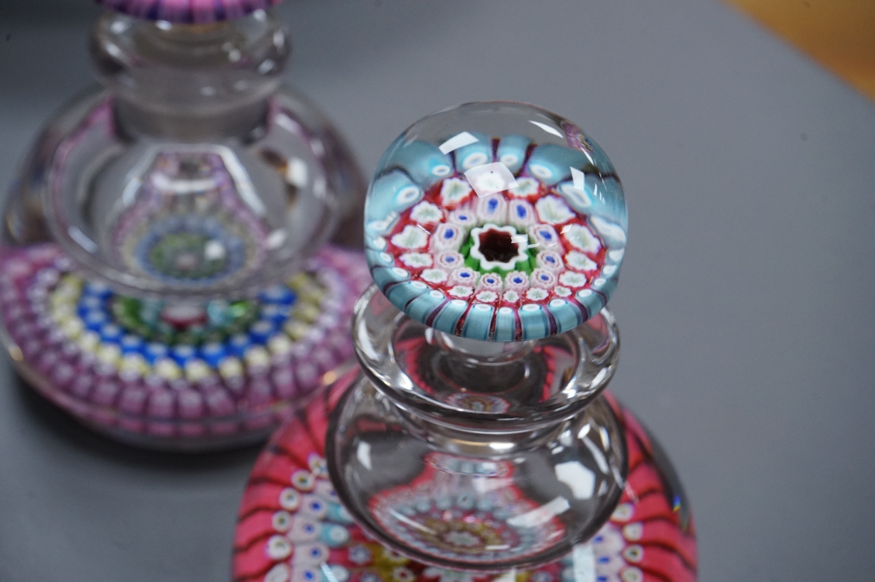 Two Whitefriars millefiori inkwells with stoppers, tallest 17cm high.